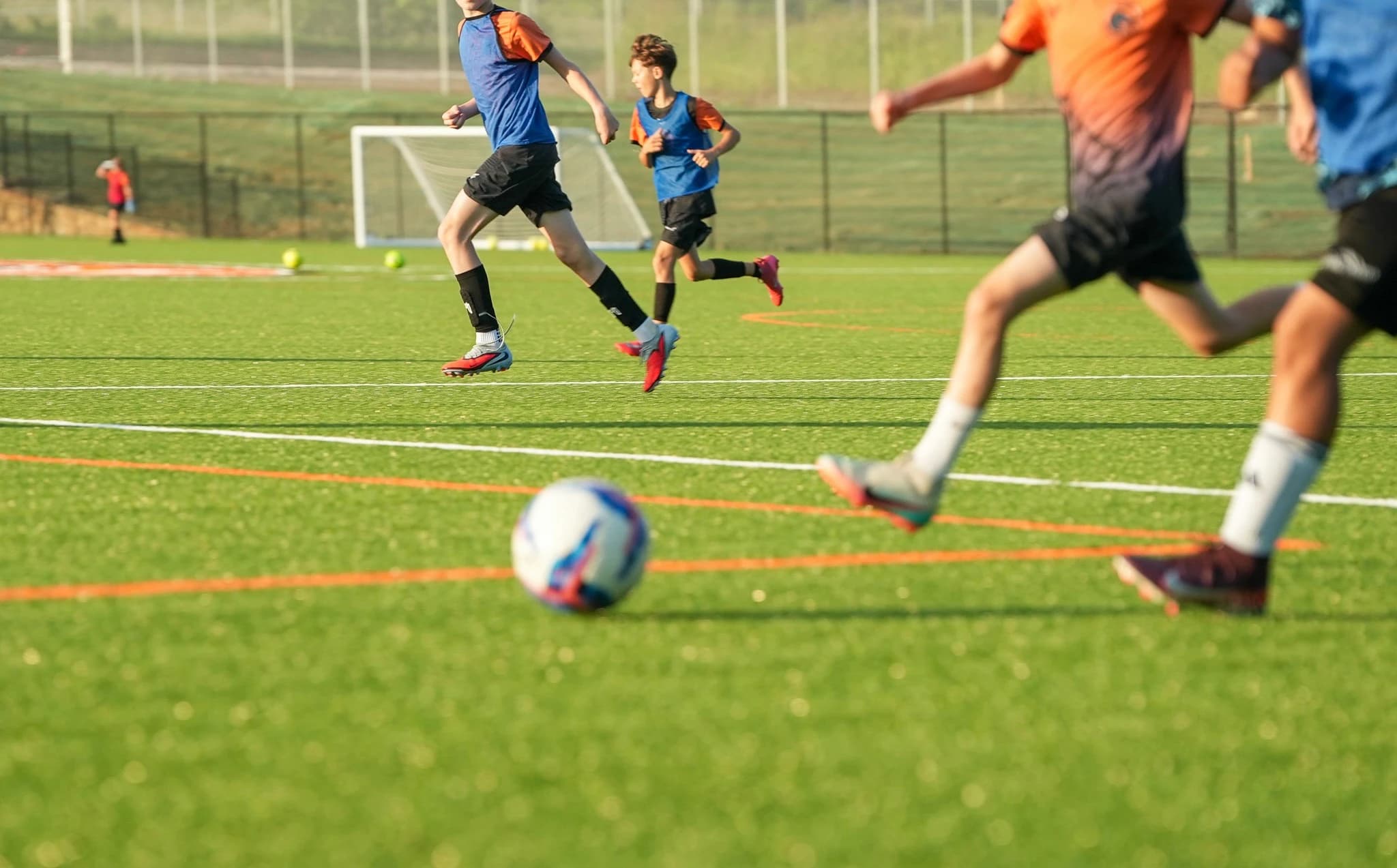 Aledo Soccer Club Academy players in a small-sided game, getting repeated touches on the ball